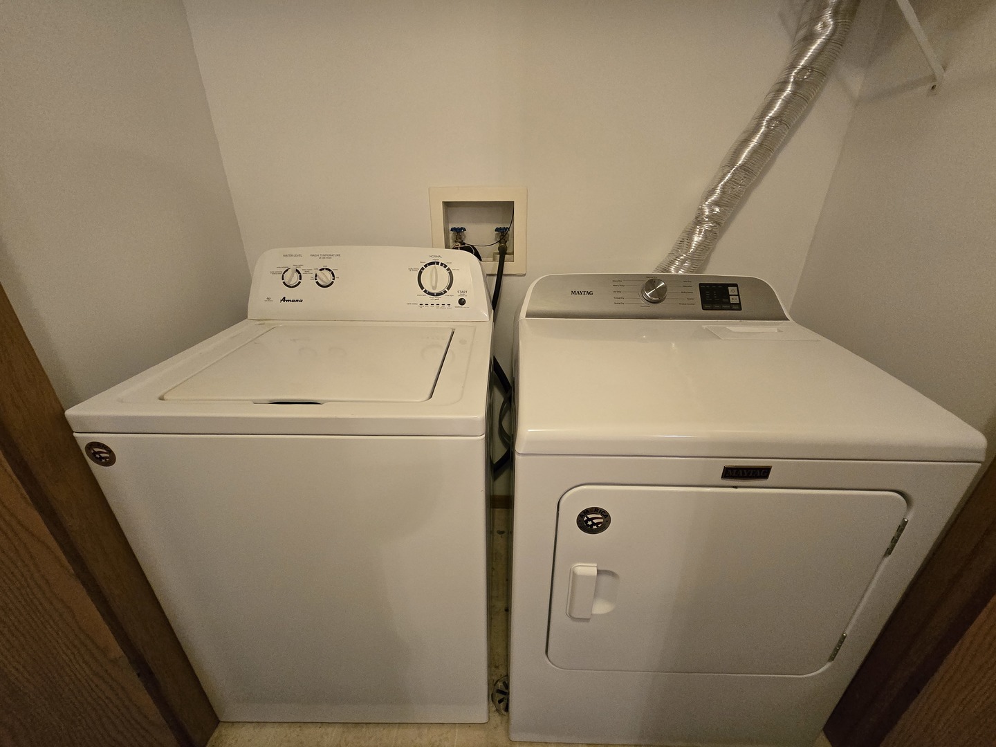 430 Cunat Boulevard, Unit 2A Richmond, IL 60071 - Photo 7 of 13 a close up of a washer and dryer