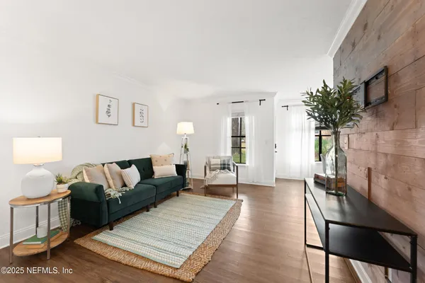 a living room with furniture and a couch