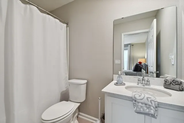 a view of a house with a big yard