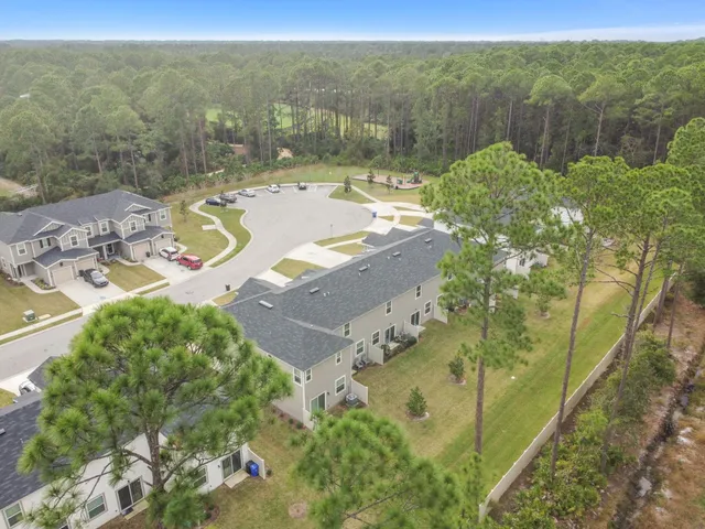 a picture of a table and chairs in the patio