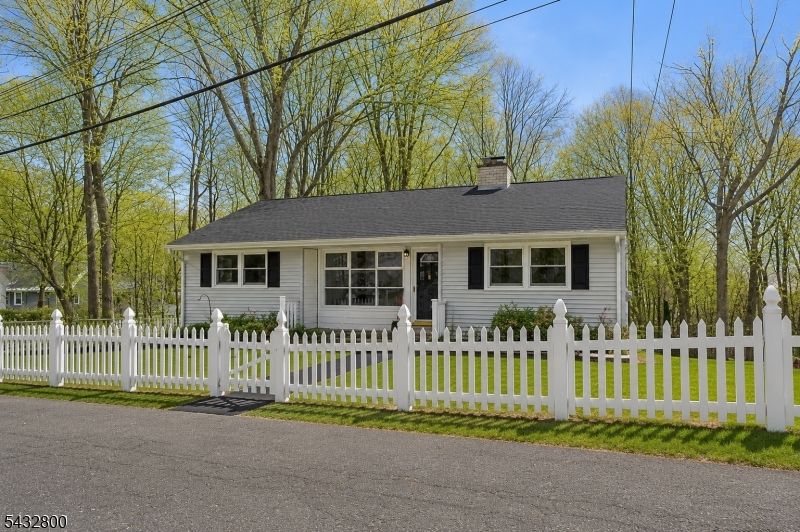 front view of a house with a small yard