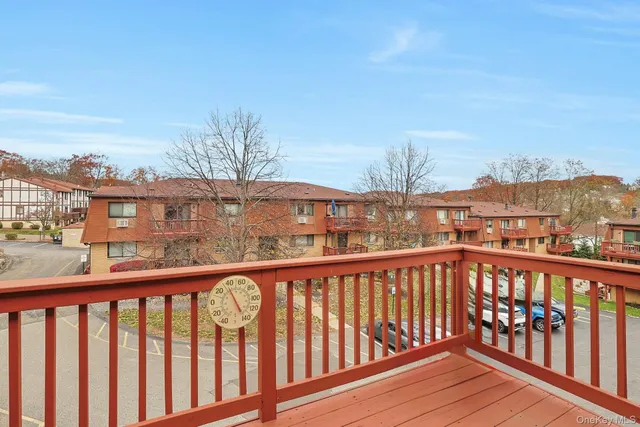 a view of a street from a balcony