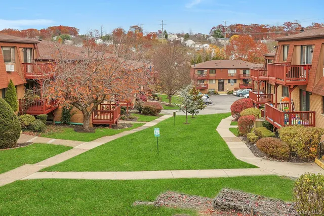 a view of a living room with a large window