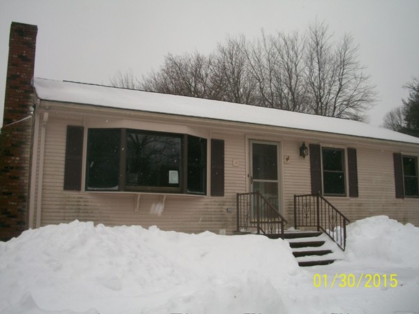 3 Highland Ridge Road Freetown, MA 02702 - Photo 1 of 21 a view of a house with a yard covered in snow