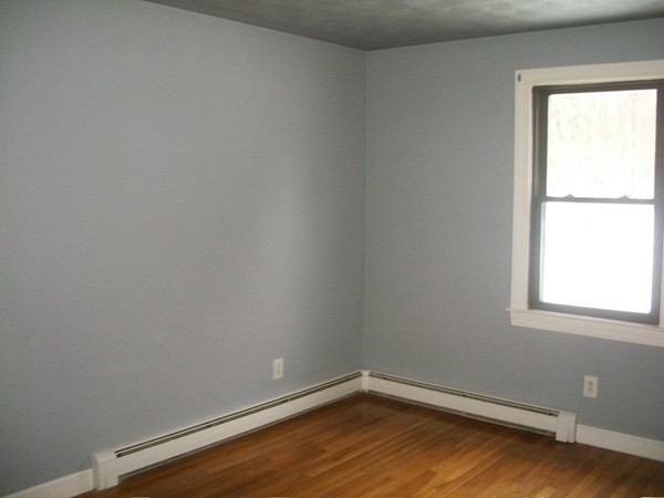3 Highland Ridge Road Freetown, MA 02702 - Photo 13 of 21 a view of a room with wooden floor and a window