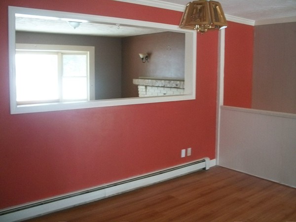 3 Highland Ridge Road Freetown, MA 02702 - Photo 9 of 21 a view of an empty room with wooden floor and a window