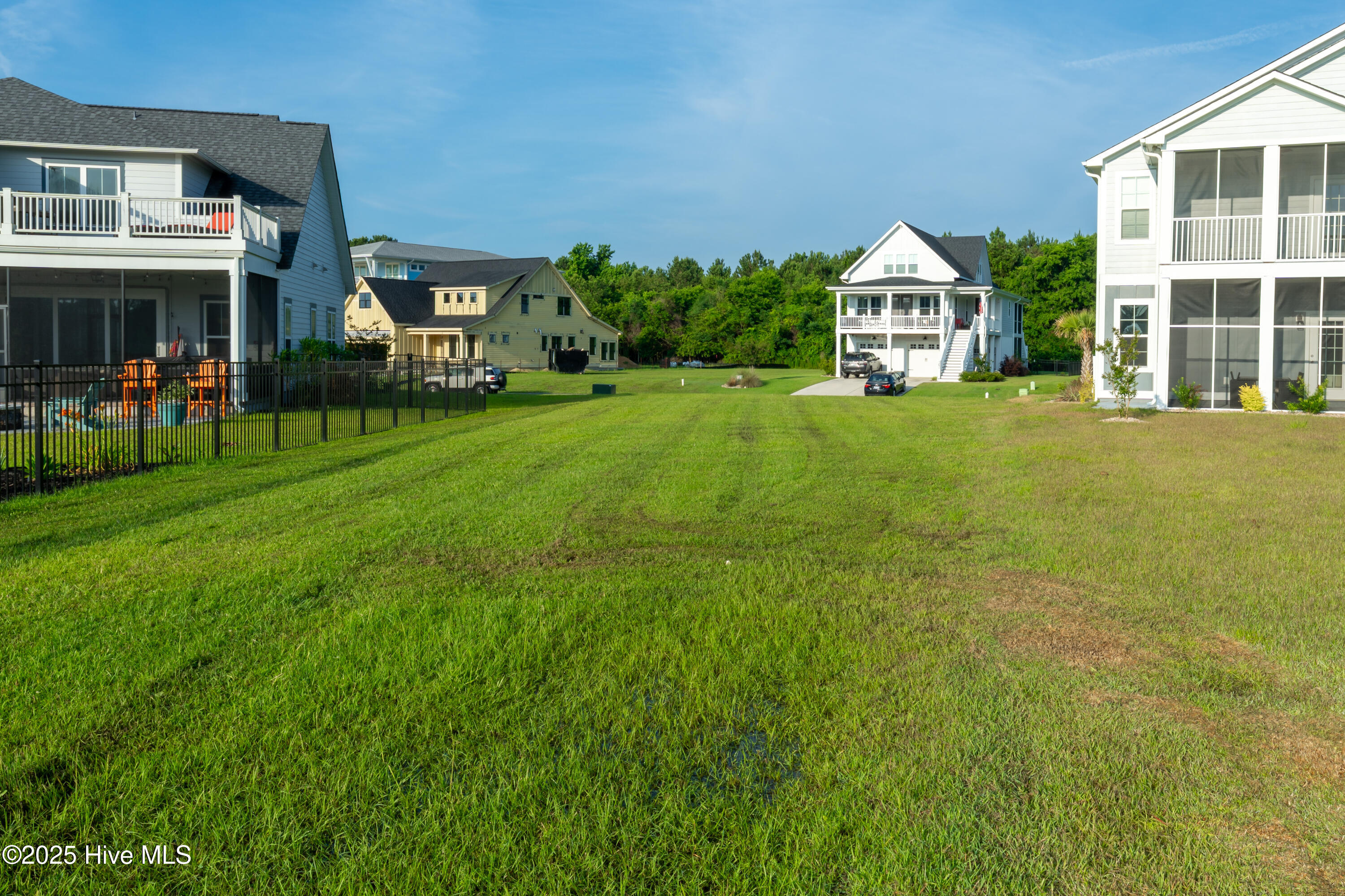 367 Summerhouse Drive Holly Ridge, NC 28445 - Photo 4 of 31 Looking towards the Summerhouse Drive. Rear of lot