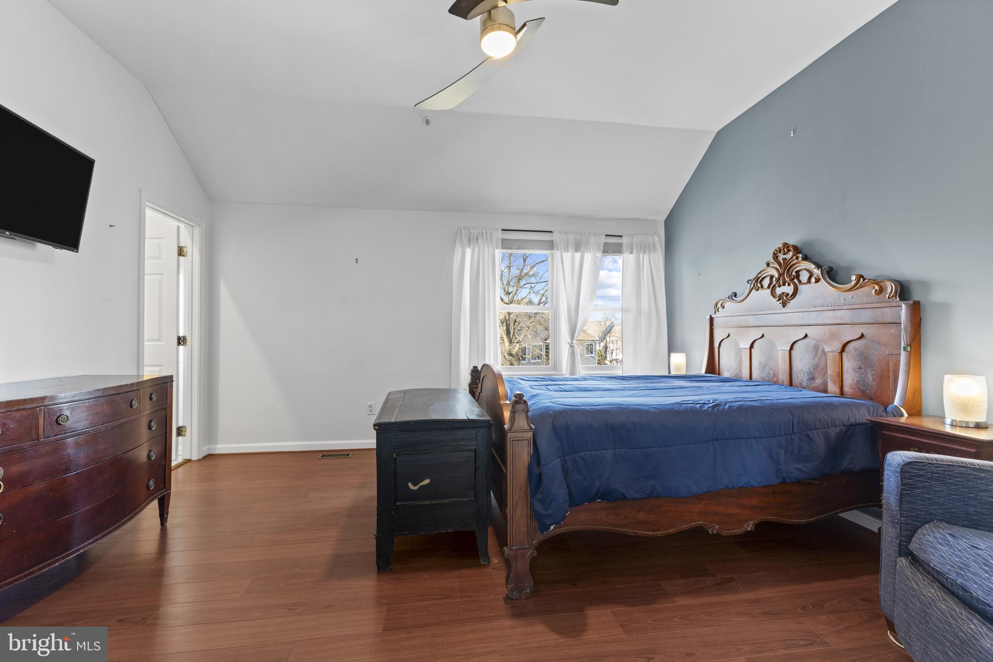 204 Ring Neck Court Chester, MD 21619 - Photo 18 of 29 a bedroom with a bed and flat screen tv