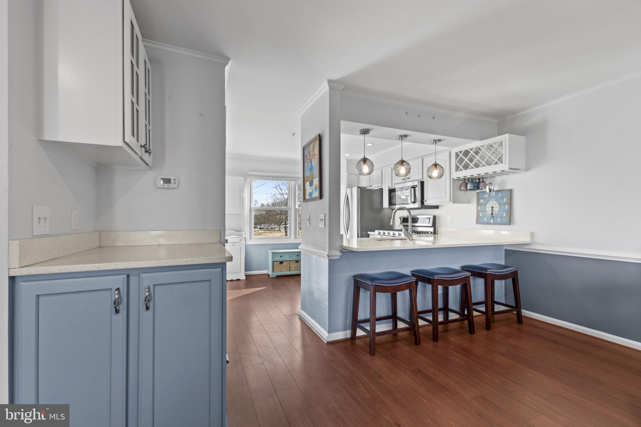 204 Ring Neck Court Chester, MD 21619 - Photo 8 of 29 a view of a kitchen and dining room