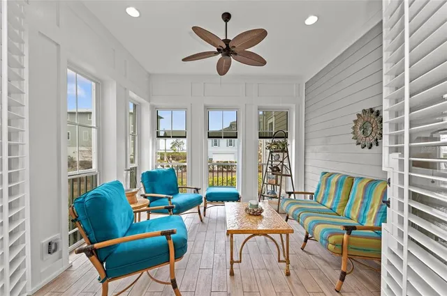 a living room with furniture rug and window