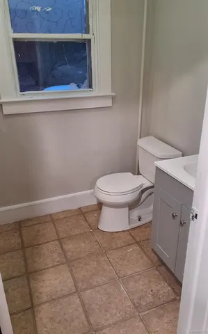 a bathroom with a toilet