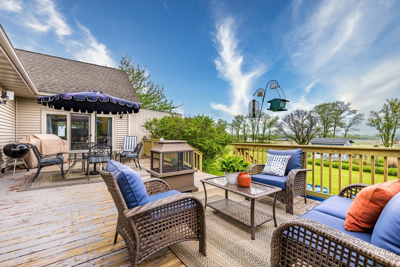 14539 Saunders Road Pecatonica, IL 61063 - Photo 41 of 55 a outdoor space with patio the couches and a potted plant