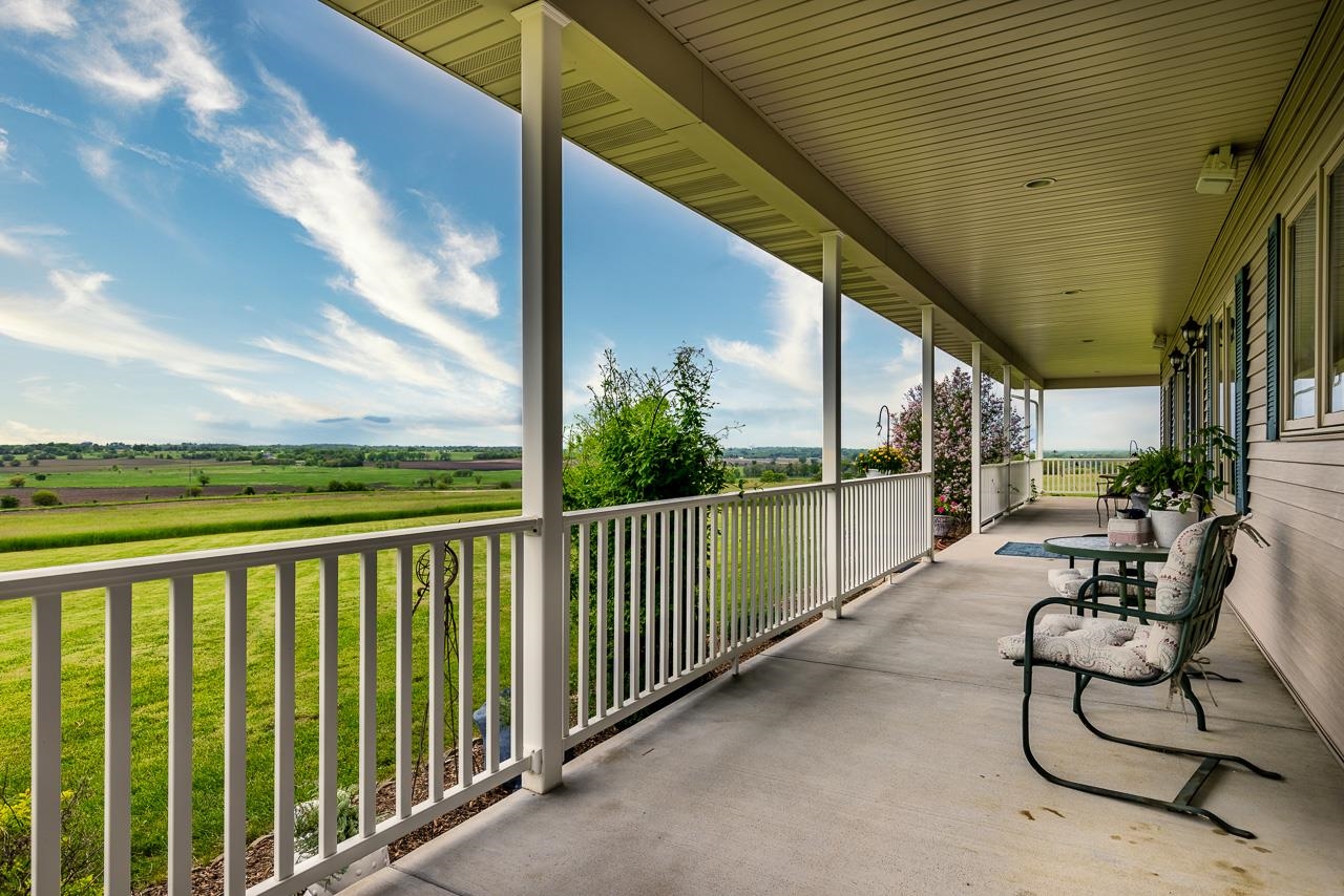 14539 Saunders Road Pecatonica, IL 61063 - Photo 50 of 55 a balcony with chairs