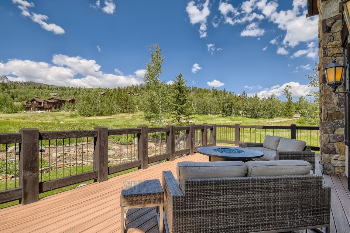 1817 Falcon Drive Silverthorne, CO 80498 - Photo 15 of 37 a balcony with furniture and a floor to ceiling window