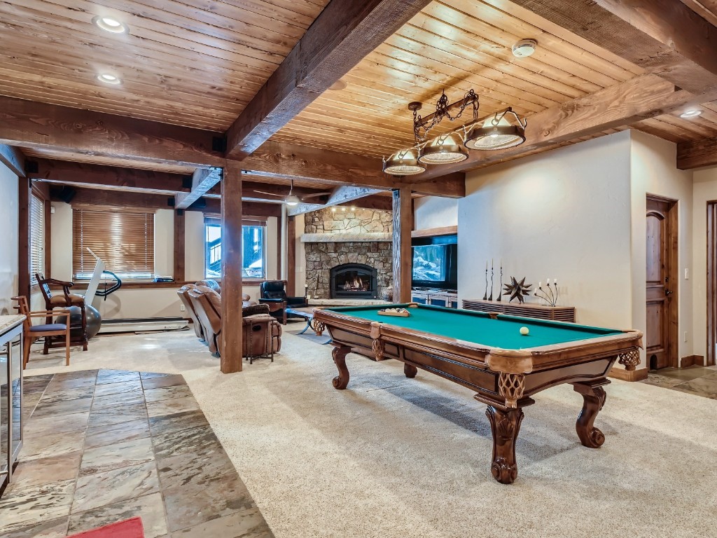 1817 Falcon Drive Silverthorne, CO 80498 - Photo 25 of 37 a living room with pool table tennis pool table and furniture