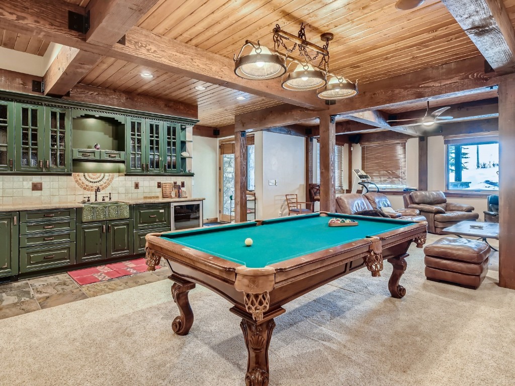 1817 Falcon Drive Silverthorne, CO 80498 - Photo 28 of 37 a room with pool table and windows