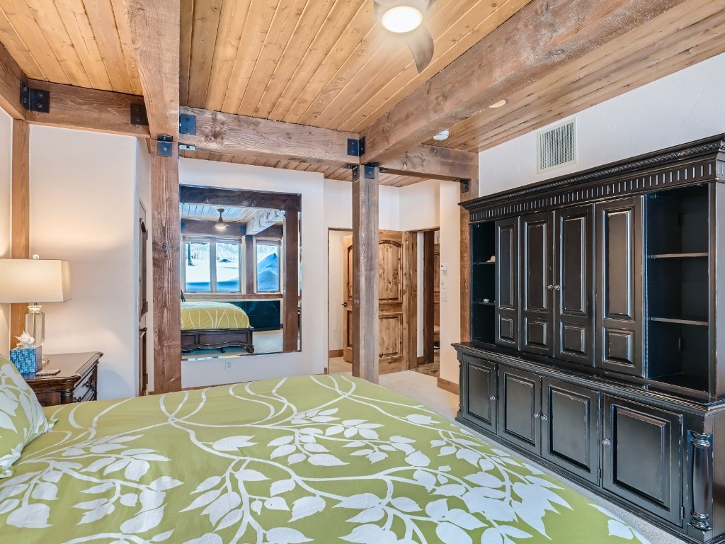 1817 Falcon Drive Silverthorne, CO 80498 - Photo 30 of 37 a bed room with a bed and a television