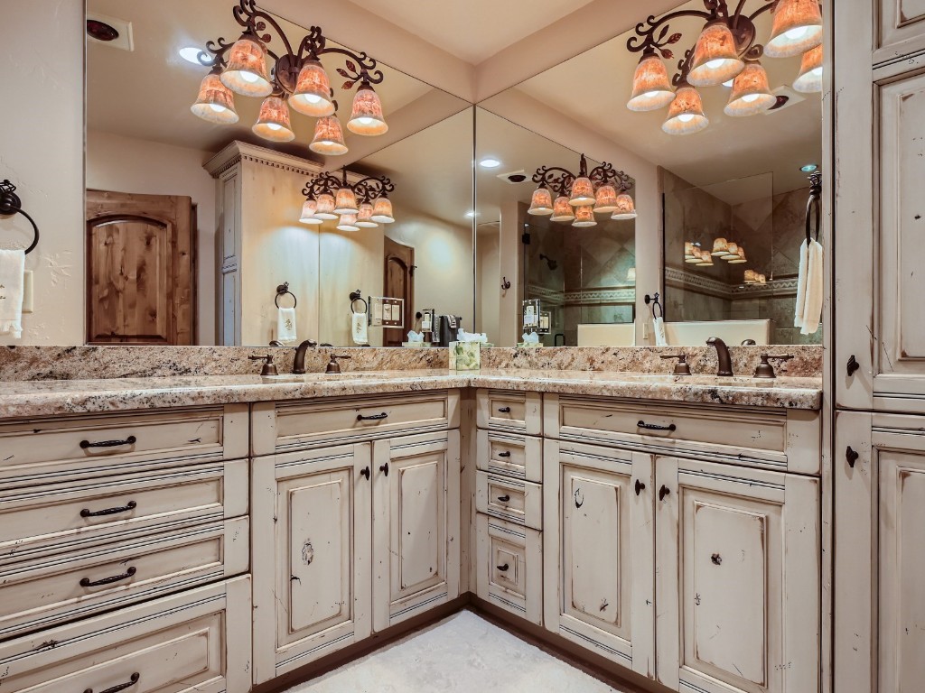 1817 Falcon Drive Silverthorne, CO 80498 - Photo 33 of 37 a bathroom with a sink vanity and a mirror
