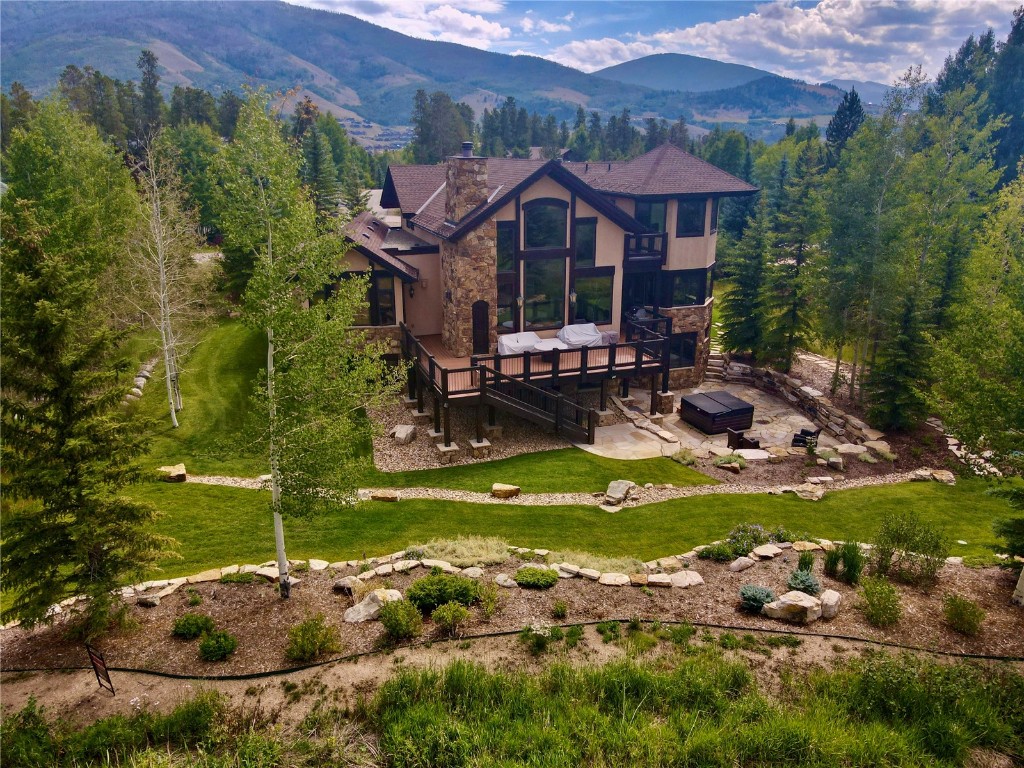 1817 Falcon Drive Silverthorne, CO 80498 - Photo 8 of 37 a view of a house with swimming pool and a yard