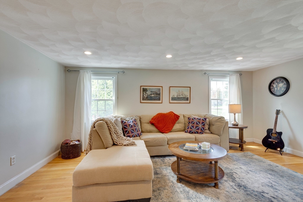 15 Williams Road North Reading, MA 01864 - Photo 14 of 38 a living room with furniture and a window
