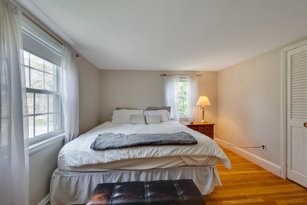 15 Williams Road North Reading, MA 01864 - Photo 22 of 38 a bedroom with a bed and window