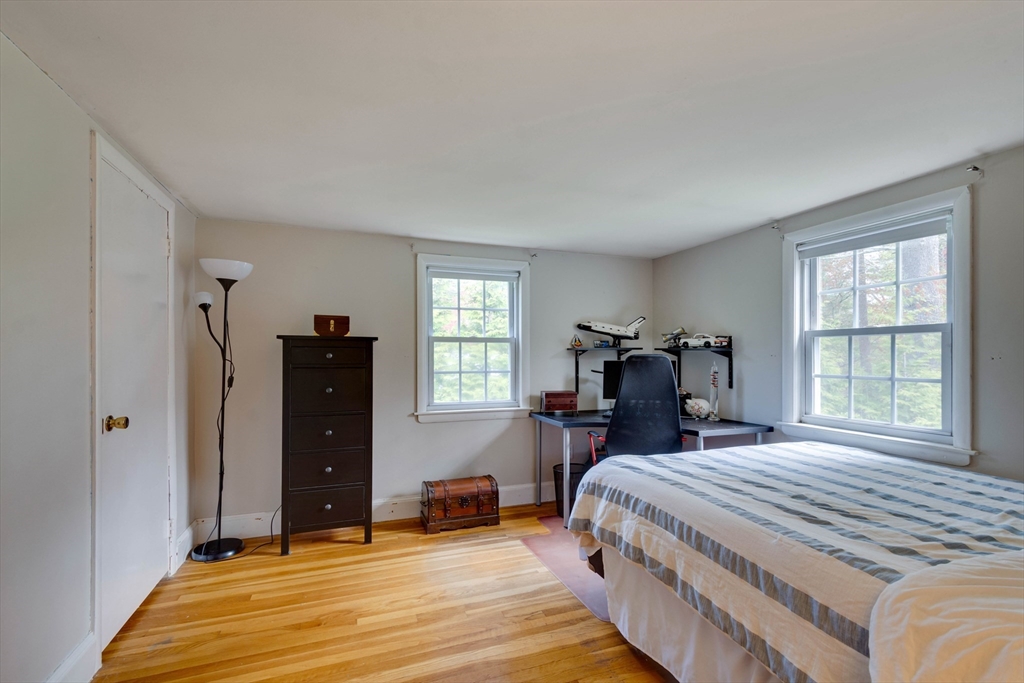 15 Williams Road North Reading, MA 01864 - Photo 24 of 38 a bedroom with a bed and a large window
