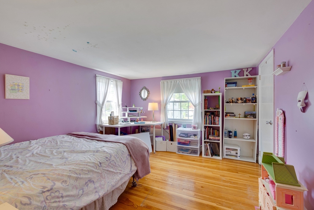 15 Williams Road North Reading, MA 01864 - Photo 26 of 38 a bed room with a bed and a book shelf