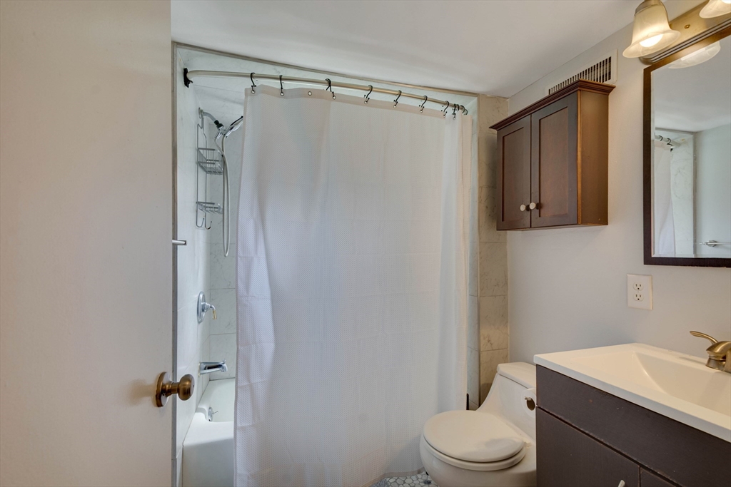15 Williams Road North Reading, MA 01864 - Photo 28 of 38 a bathroom with a granite countertop sink toilet and shower