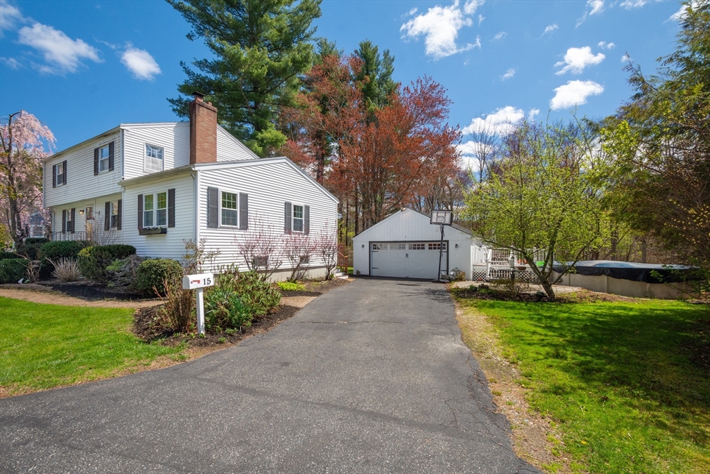 15 Williams Road North Reading, MA 01864 - Photo 3 of 38 a front view of house with yard and green space