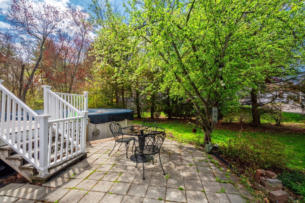 15 Williams Road North Reading, MA 01864 - Photo 36 of 38 a view of a patio with a table and chairs
