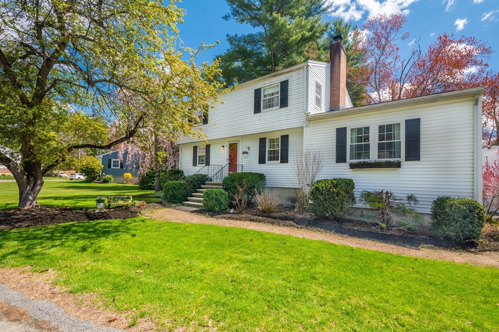 15 Williams Road North Reading, MA 01864 - Photo 4 of 38 a view of a house with a backyard