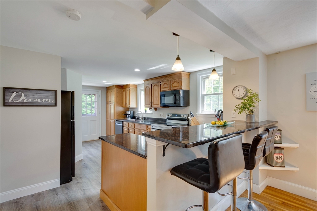 15 Williams Road North Reading, MA 01864 - Photo 7 of 38 a view of a kitchen and dining room