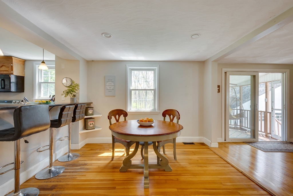 15 Williams Road North Reading, MA 01864 - Photo 9 of 38 a view of a dining room with furniture and wooden floor