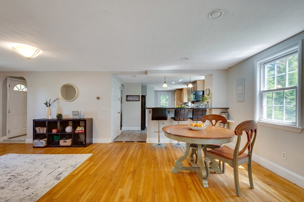 15 Williams Road North Reading, MA 01864 - Photo 10 of 38 a dining room with a table and chairs