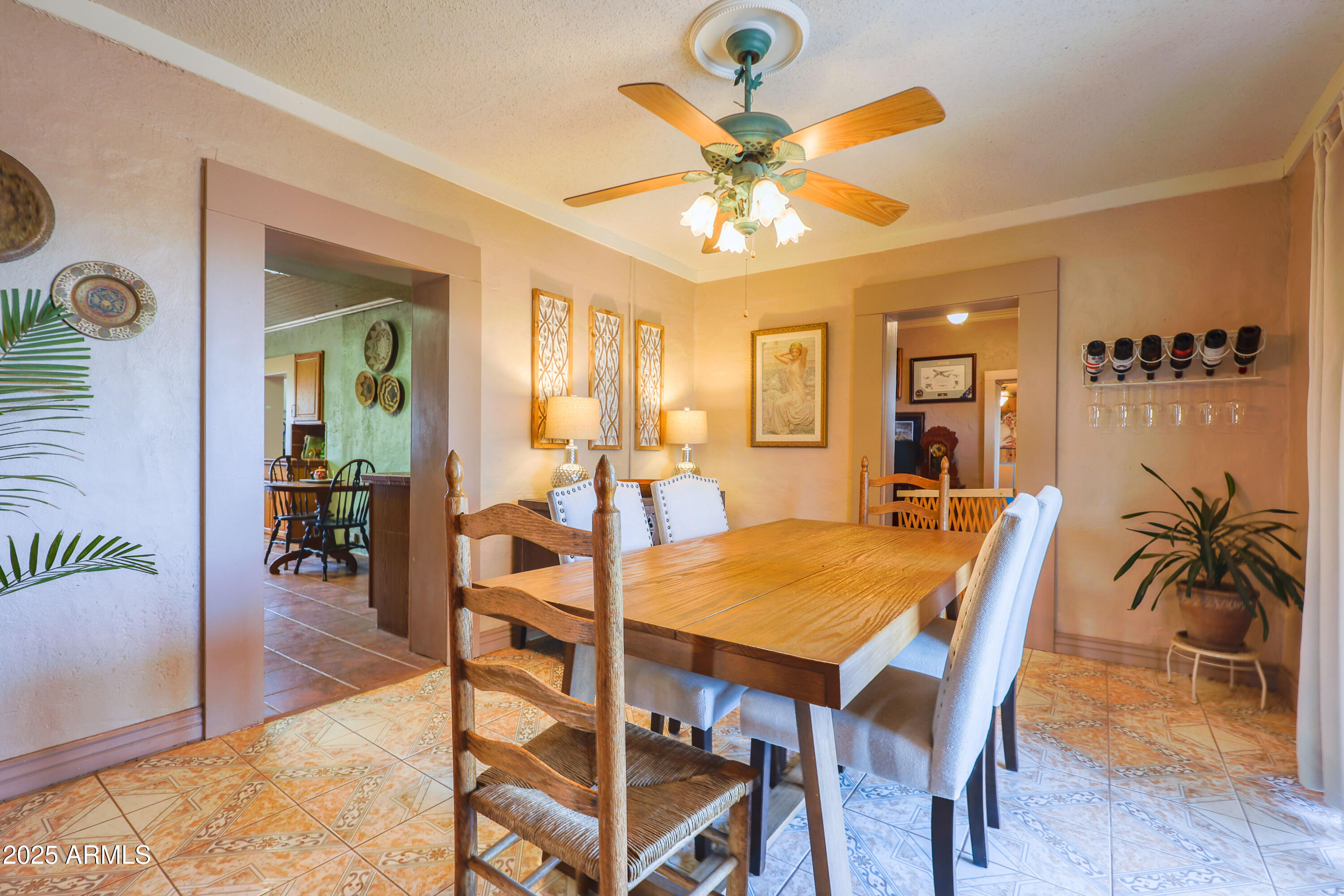 4755 West Morin Road McNeal, AZ 85617 - Photo 11 of 37 a view of a dining room with furniture and wooden floor