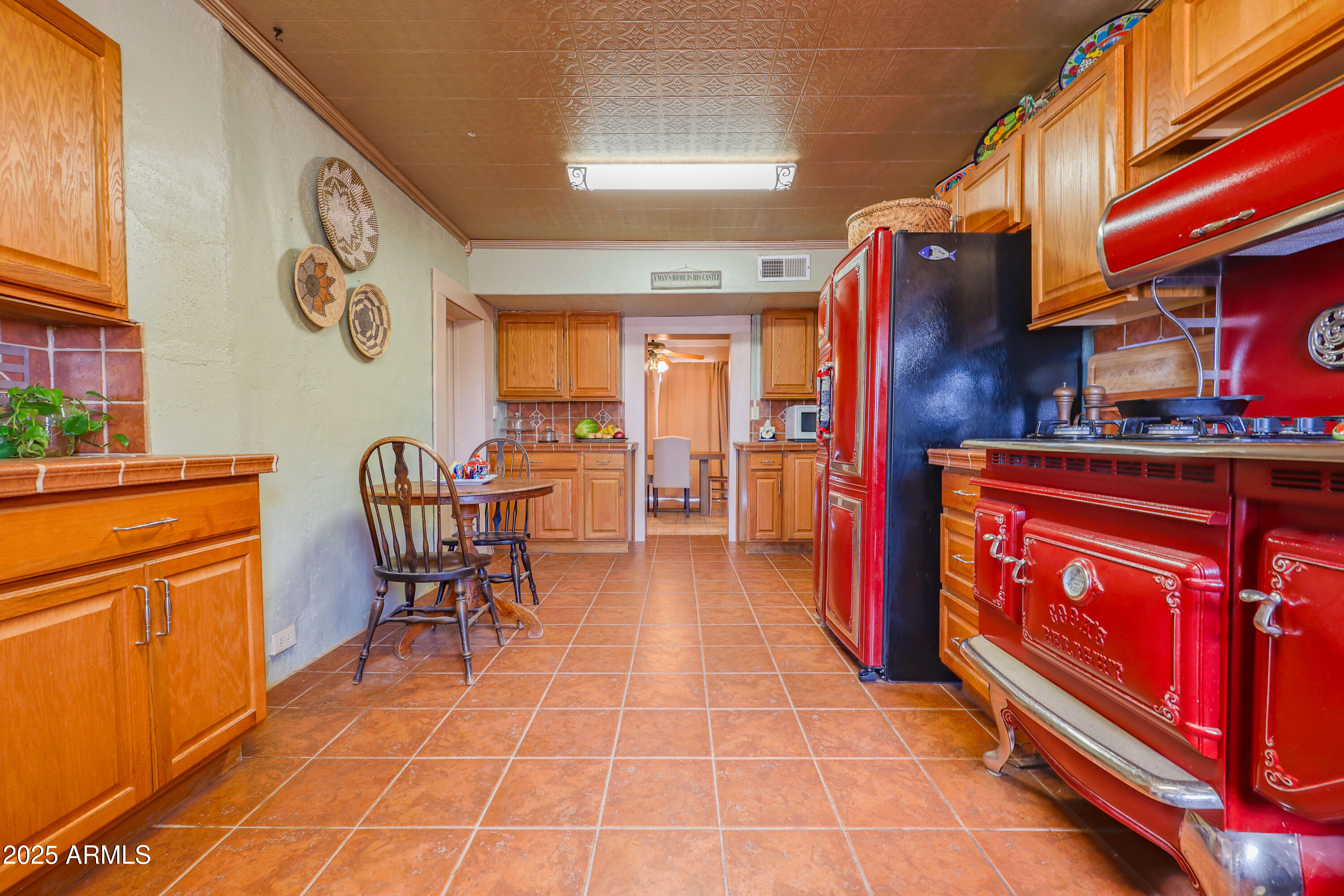 4755 West Morin Road McNeal, AZ 85617 - Photo 12 of 37 a view of a chairs and a stove