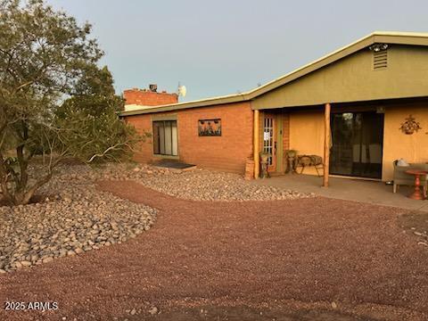 4755 West Morin Road McNeal, AZ 85617 - Photo 32 of 37 a view of a house with backyard and a tree