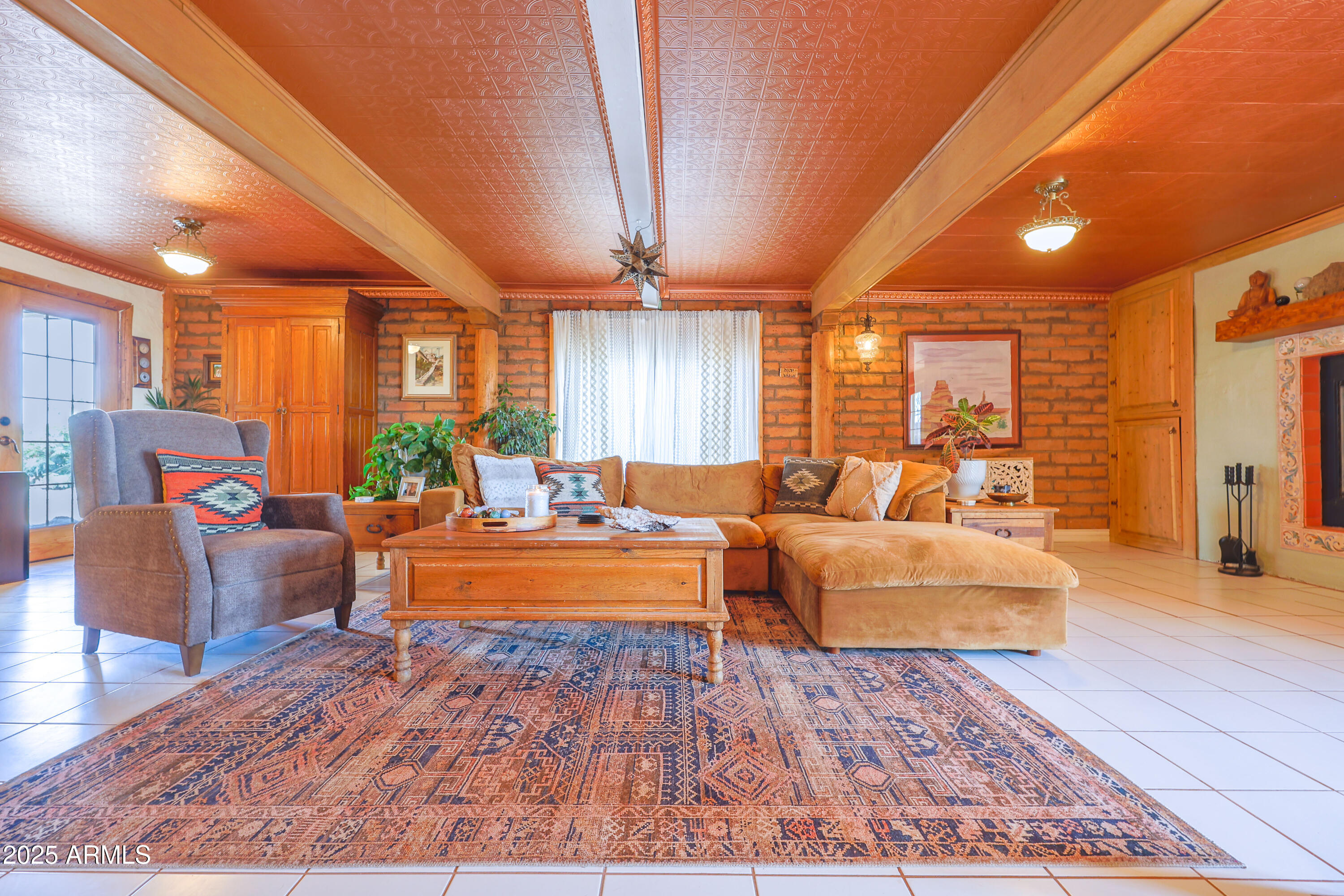 4755 West Morin Road McNeal, AZ 85617 - Photo 4 of 37 a living room with furniture and a wooden floor