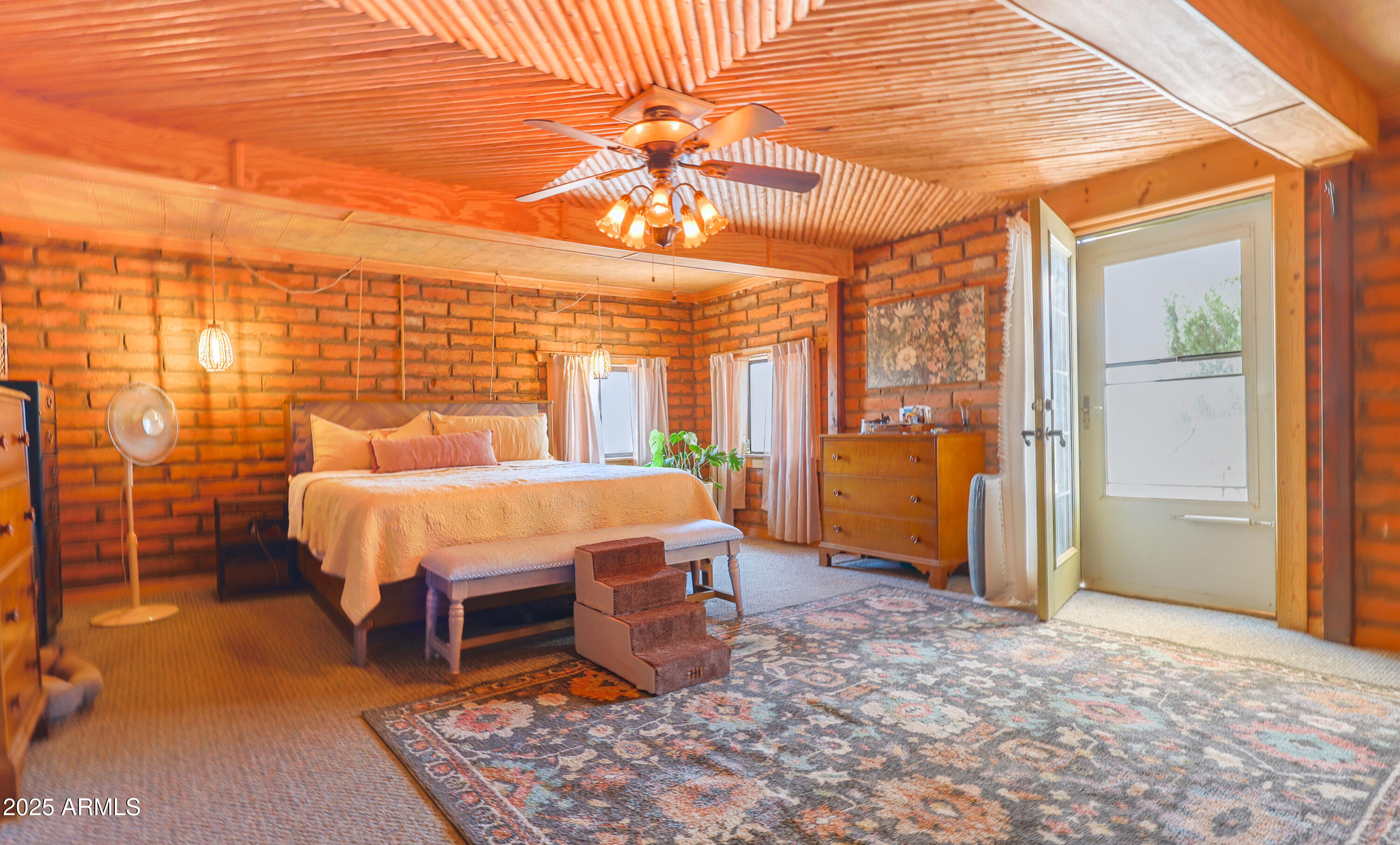 4755 West Morin Road McNeal, AZ 85617 - Photo 6 of 37 a bed sitting in a spacious bedroom next to a window