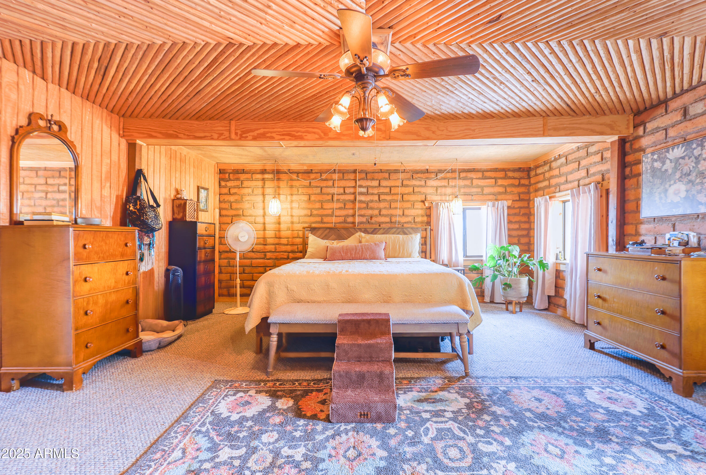 4755 West Morin Road McNeal, AZ 85617 - Photo 7 of 37 a bed room with a bed and window
