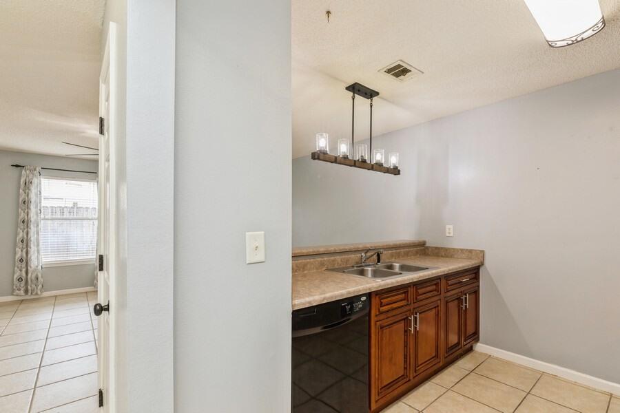 501 Keystone Road Mary Esther, FL 32569 - Photo 15 of 36 a bath room with a sink and a mirror