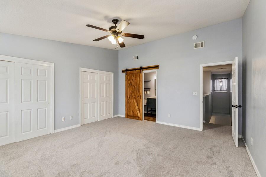 501 Keystone Road Mary Esther, FL 32569 - Photo 20 of 36 a view of an empty room with a chandelier fan