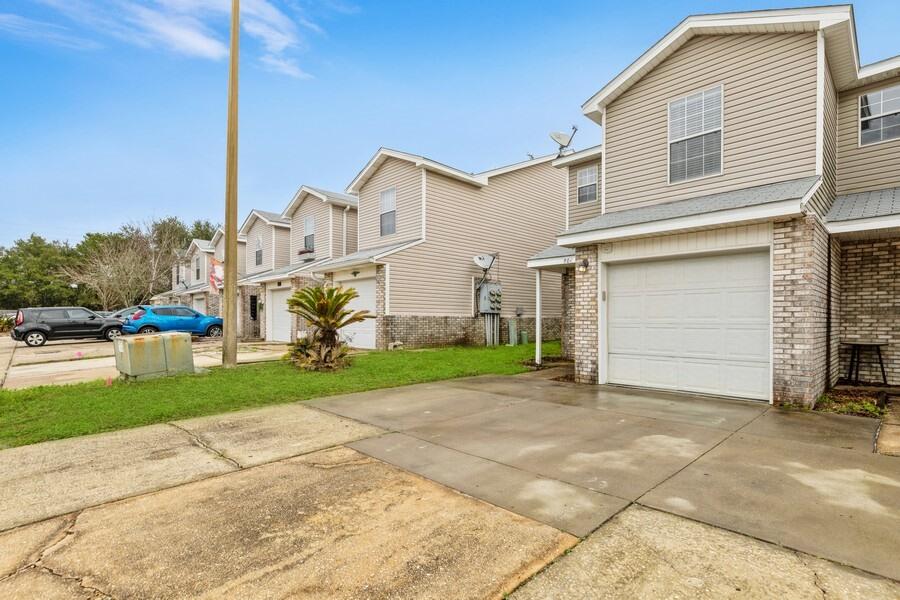 501 Keystone Road Mary Esther, FL 32569 - Photo 2 of 36 a view of a house with a patio