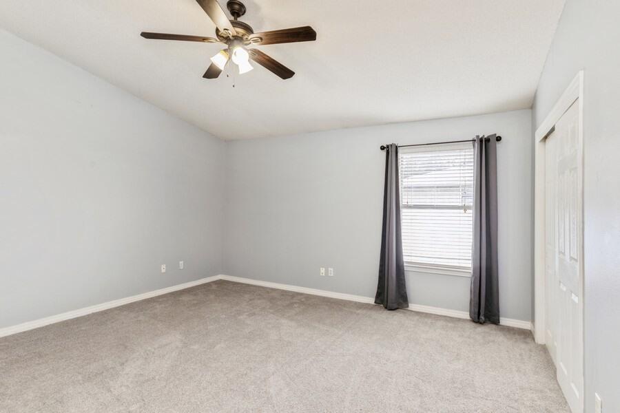 501 Keystone Road Mary Esther, FL 32569 - Photo 21 of 36 an empty room with closet and windows