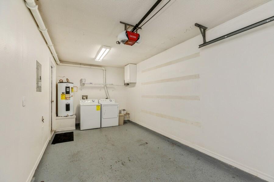 501 Keystone Road Mary Esther, FL 32569 - Photo 34 of 36 a view of a storage & utility room with racks on the wall