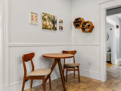 a table and chair in a room