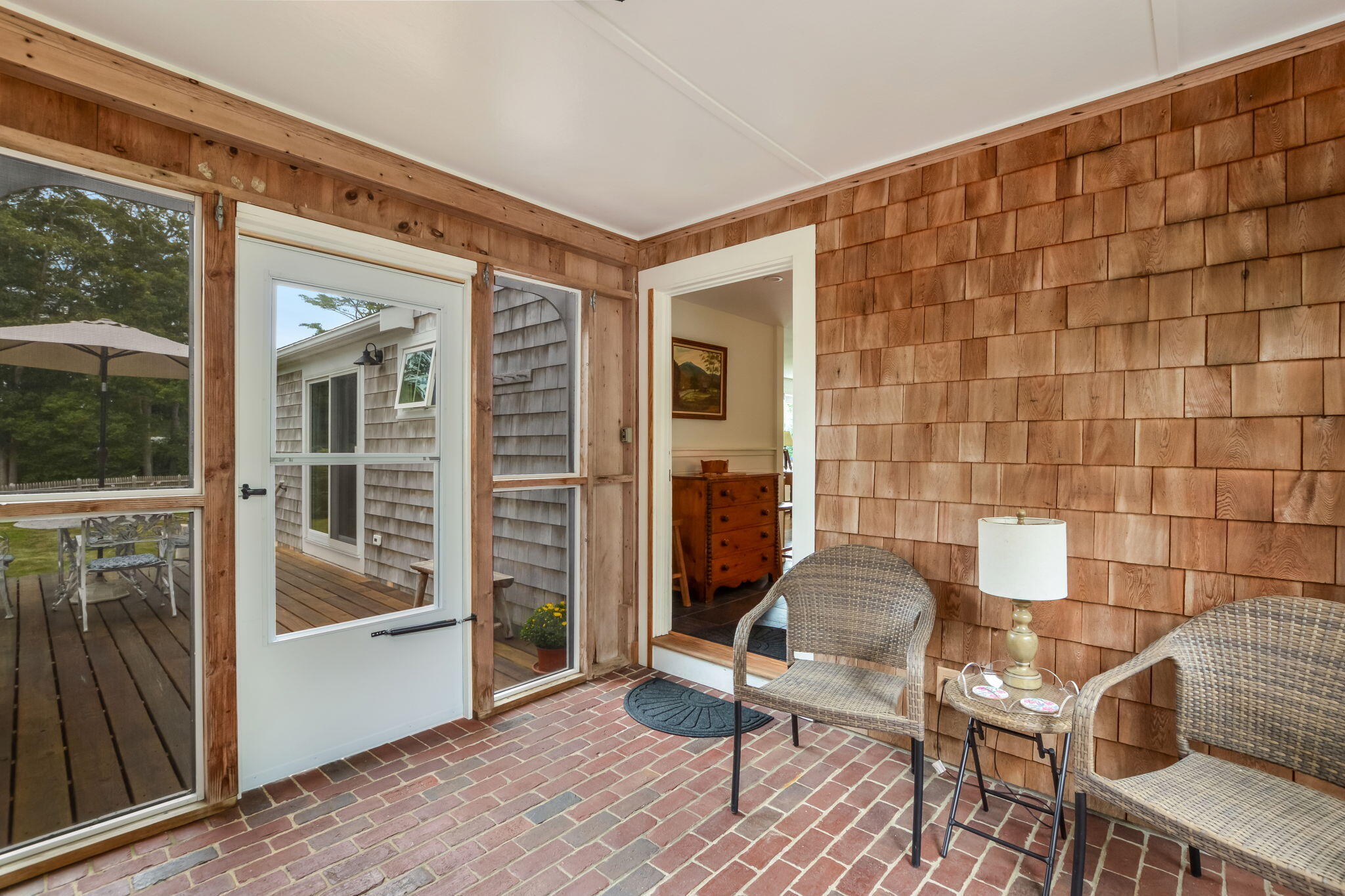 141 Pond View Drive Centerville, MA 02632 - Photo 11 of 44 a balcony with table and chairs