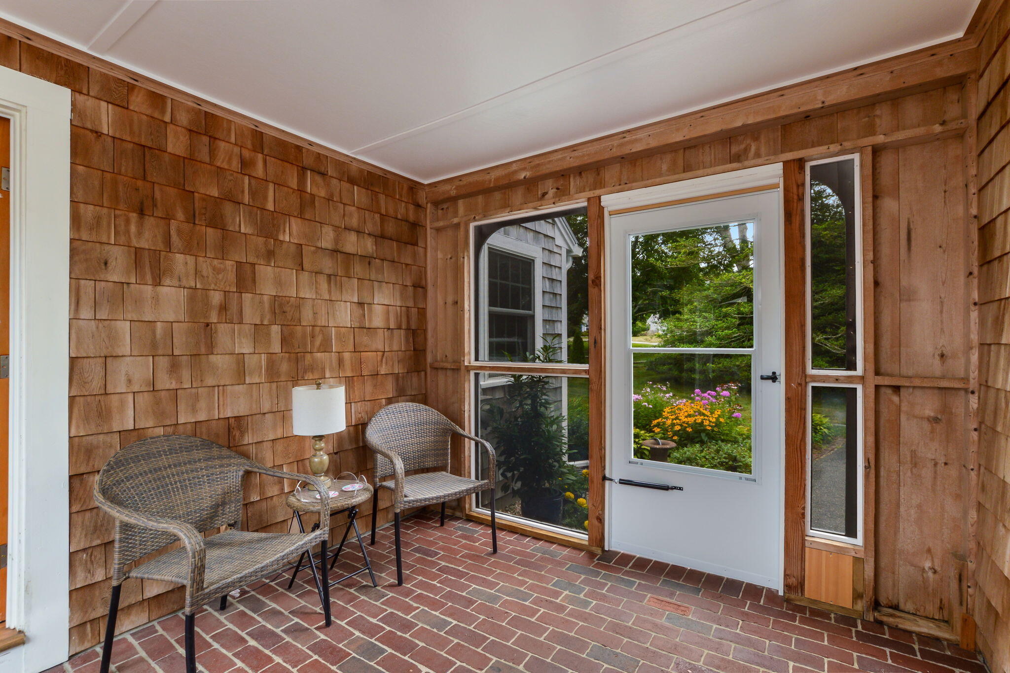 141 Pond View Drive Centerville, MA 02632 - Photo 12 of 44 a balcony with furniture and with potted plants
