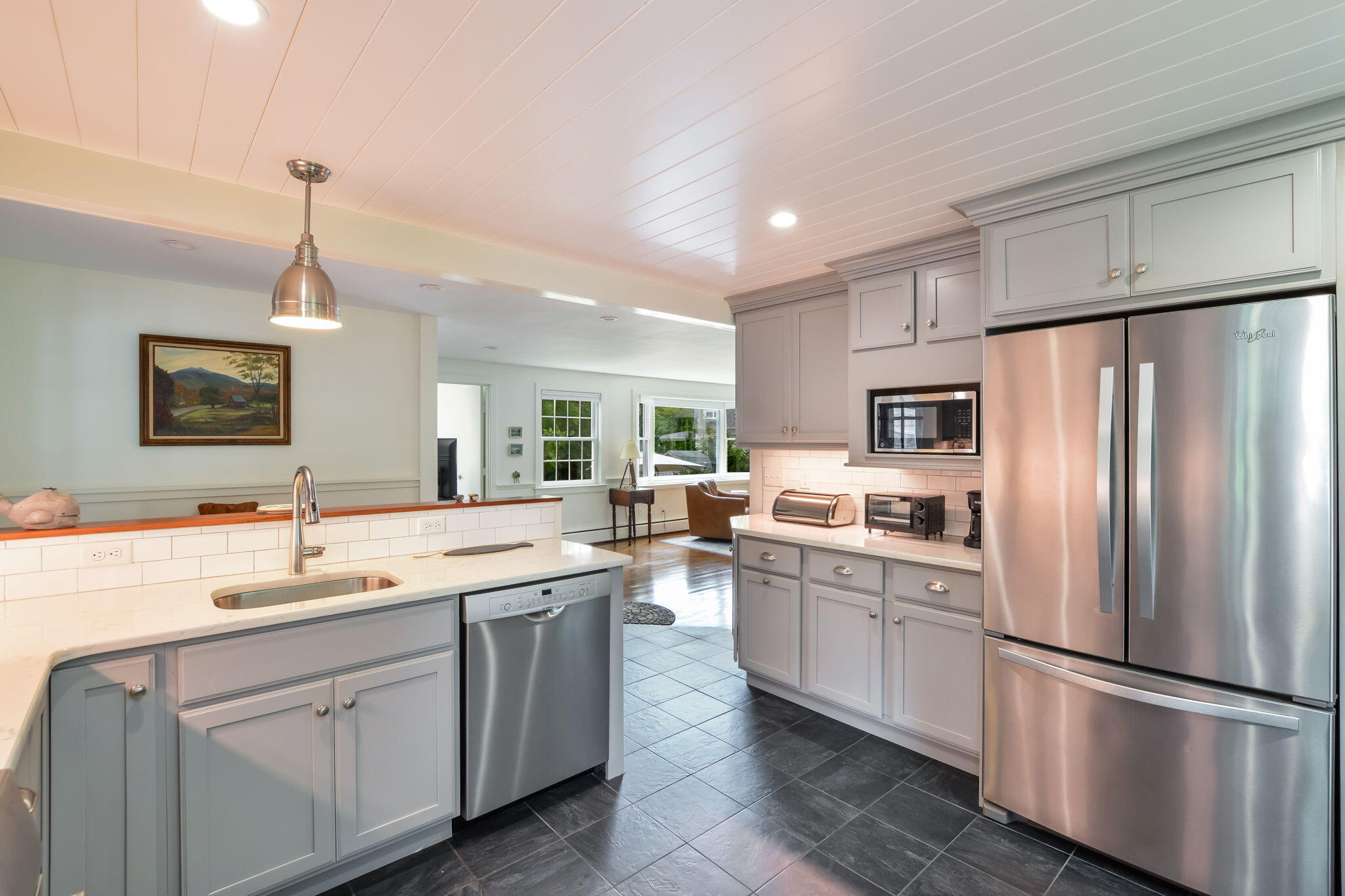 141 Pond View Drive Centerville, MA 02632 - Photo 15 of 44 a kitchen with white cabinets and stainless steel appliances