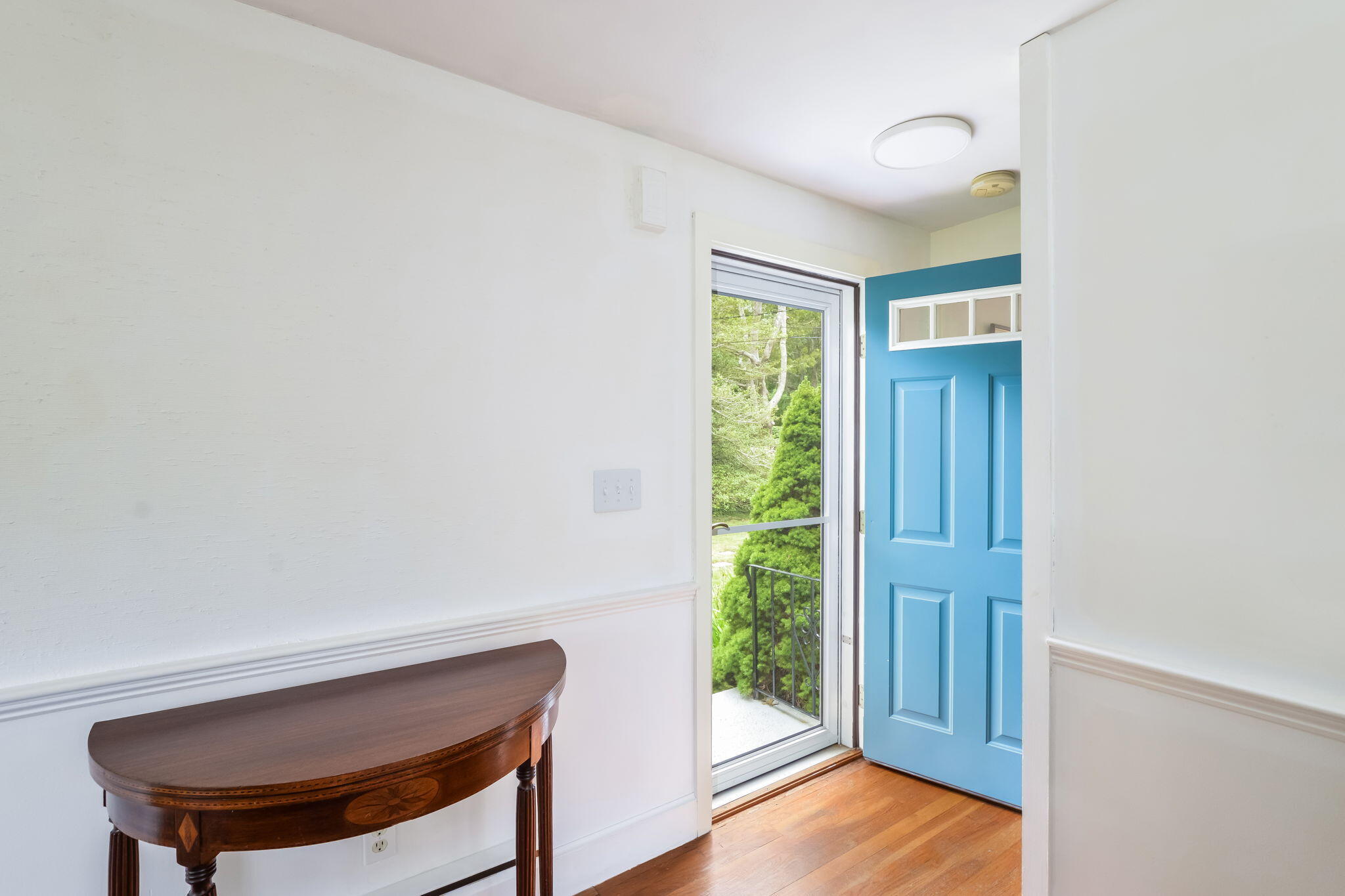 141 Pond View Drive Centerville, MA 02632 - Photo 19 of 44 a view of room with window and wooden floor